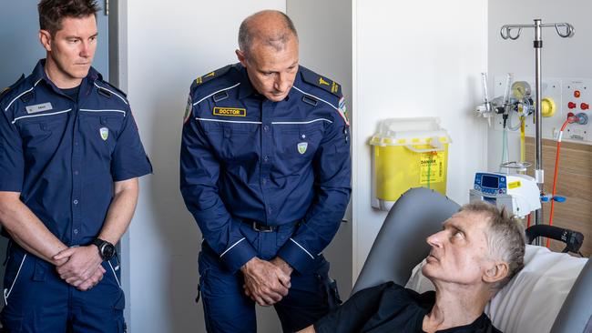 Ambulance Tasmania's Adam Marmion and Dr Jo Kippax with patient. Critically injured Lithuanian kayaker who was winched from Franklin River and had his leg amputated to be rescued, reunites with rescuers. Picture: Supplied