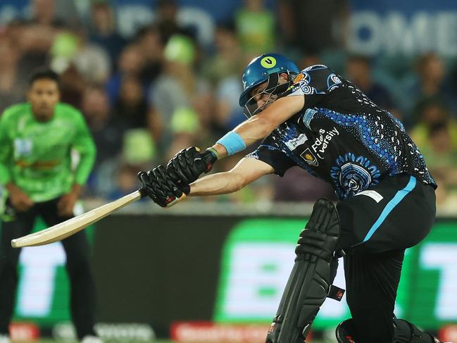 Jamie Overton launches against Sydney Thunder. Picture: Mark Metcalfe/Getty Images