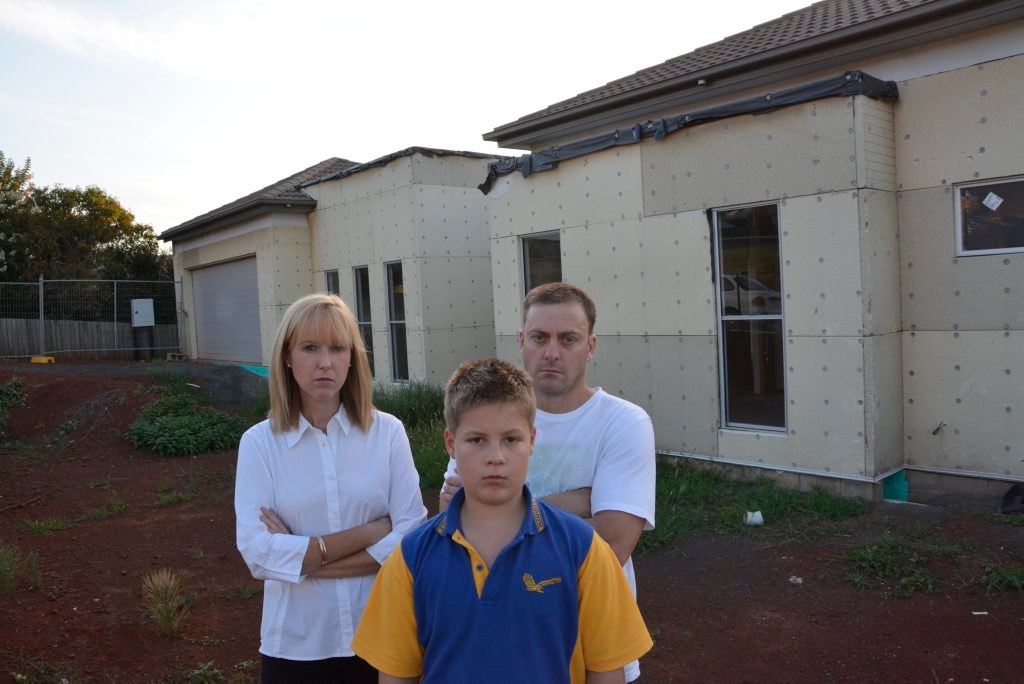 The Barton family (from left) Priscilla, Jaiden and Robert Barton outside their unbuilt Rangeville home. . Picture: Tara Miko