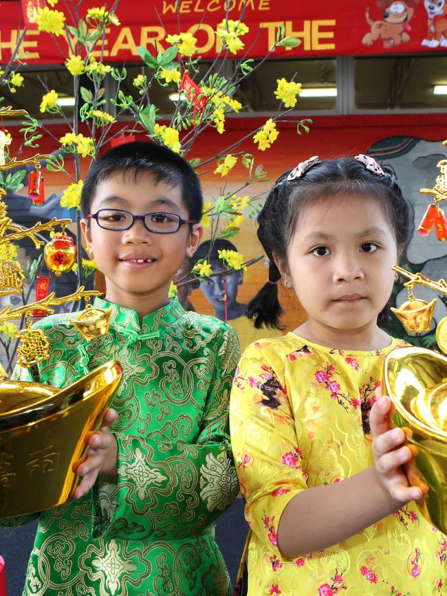 Hubert Dang, 7, and Hong-Anh Mai, 6, during last year’s celebrations at Cabramatta. Picture: Robert Pozo