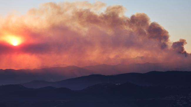 Multiple bushfires fuelled by intense winds are burning across Los Angeles County. Picture: Mario Tama/Getty Images/AFP