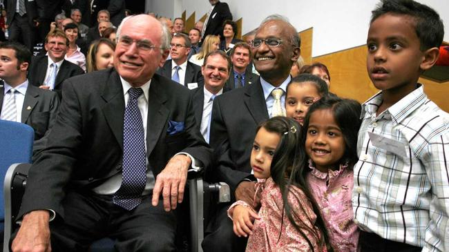 OPEN: John Howard and Maha Sinnathamby at USQ in 2006. Picture: QT File