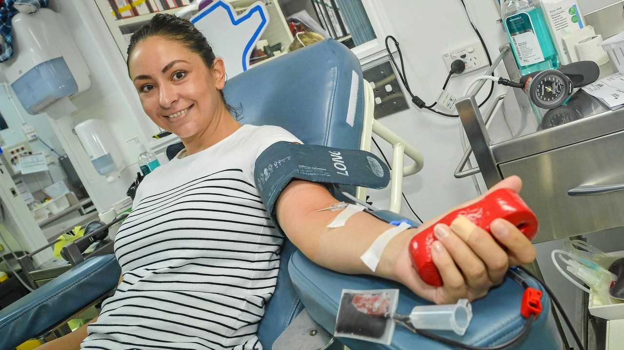 CHRISTMAS DONATIONS: Holly Lucas, is giving blood again in Gladstone after a recent break due to pregnancy, but says it's worth the effort to save three lives. Picture: Matt Taylor GLA201217BLOOD