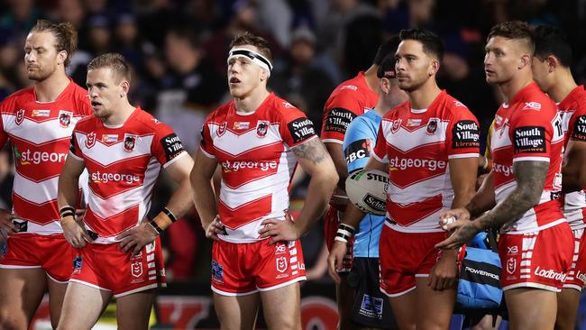 Dragons players look dejected after a Panthers try during the round 18 NRL match between Penrith and St George Illawarra. Picture: Getty Images