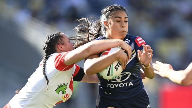 Jasmine Peters is tackled during round seven. (Photo by Ian Hitchcock/Getty Images)