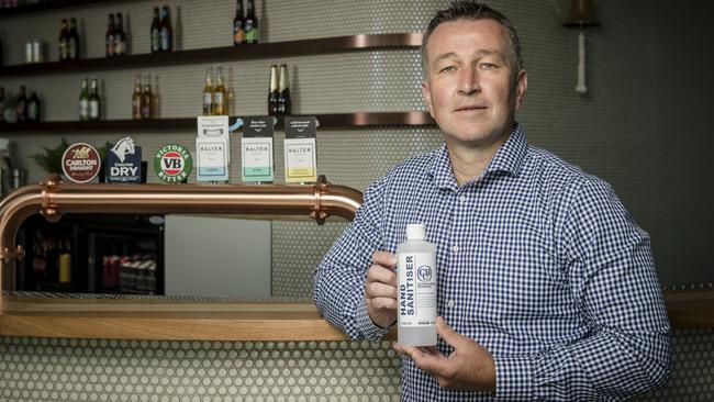 CUB chief executive Peter Filipovic with hand sanitiser, which the brewer will donate to frontline medical personnel