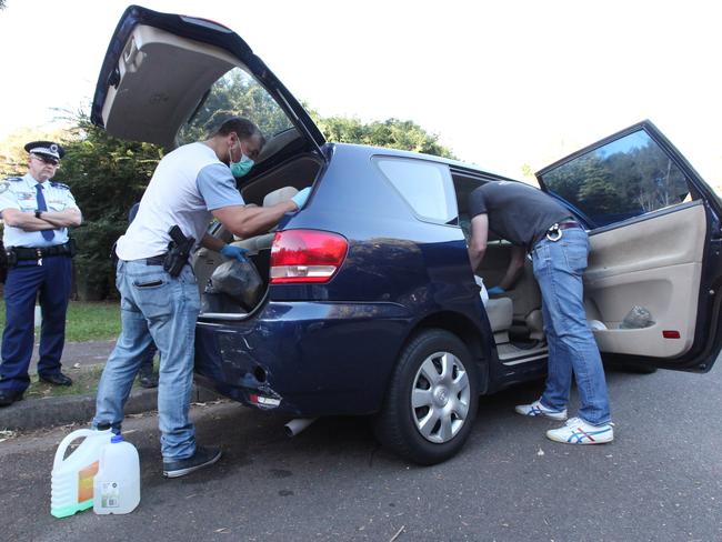 Police searched cars while collecting evidence at Tamim Khaja’s home. Picture: Hollie Adams