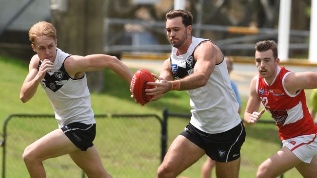 Southport Sharks and Redland do battle in a NEAFL practice match in March. Picture: Steve Holland)