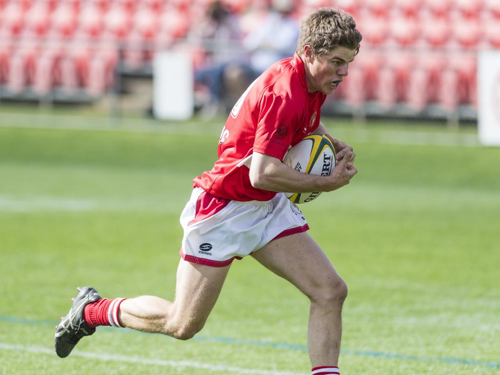 Billy Packer on the way to score for the Frillnecks. Picture: Kevin Farmer.