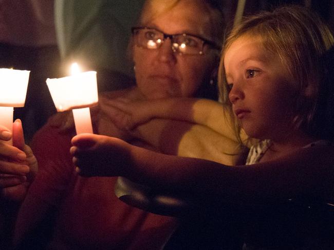 Mourners gather following the mass shooting in Sutherland Springs, Texas. Picture: AFP