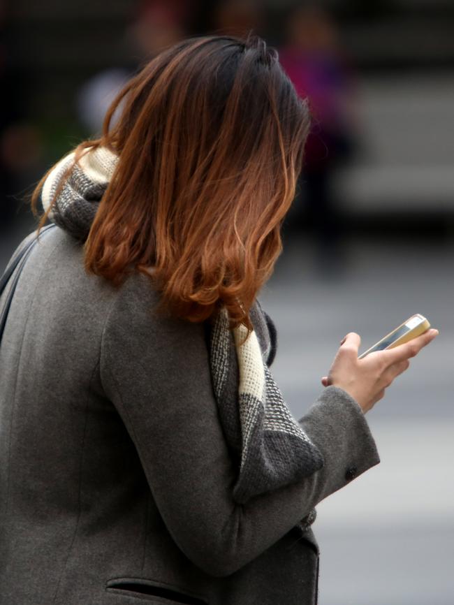 Pedestrians are being urged to put down their phones when using our roads.