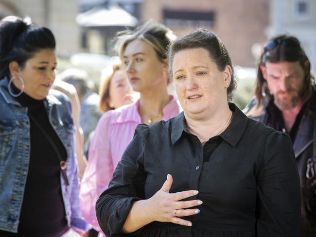 Katrina Munting, a victim survivor of child sexual abuse, reacts to the Commission of Inquiry report being tabled in parliament. Picture: Chris Kidd