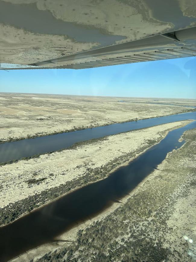 Flood waters travel through Channel Country in the far northeast of South Australia heading towards Lake Eyre. Picture: Wrights Air