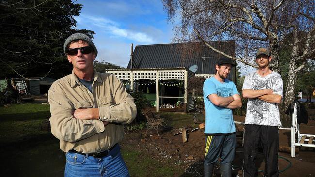 Family members of Mary Allford who died in her home during flooding at Latrobe: Mary's son Michael Allford, grandsons Aaron Allford and Michael Warren. PICTURE CHRIS KIDD