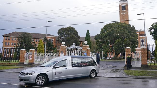 The hearse leaves the funeral.