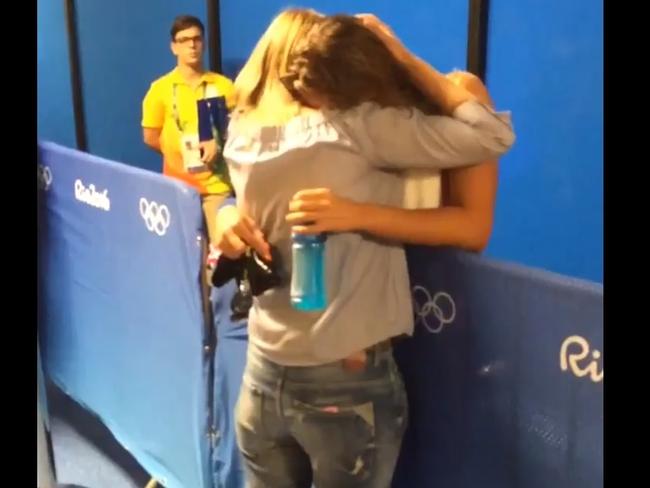 Yulia Efimova needs comforting after her race.