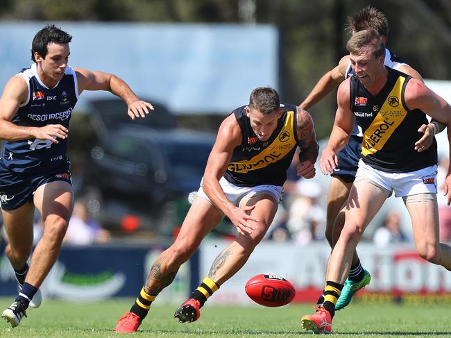 30.3.2018.SANFL. South vs Glenelg at Hickinbotham Oval, Noarlunga. Jesse White attempts to pick up the ball. PIC:TAIT SCHMAAL.