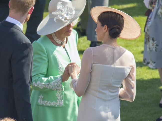 LONDON, ENGLAND - MAY 22:  Prince Harry, Duke of Sussex, Camilla, Duchess of Cornwall and Meghan, Duchess of Sussex attend The Prince of Wales' 70th Birthday Patronage Celebration held at Buckingham Palace on May 22, 2018 in London, England. (Photo by Ian Vogler-WPA Pool/Getty Images)