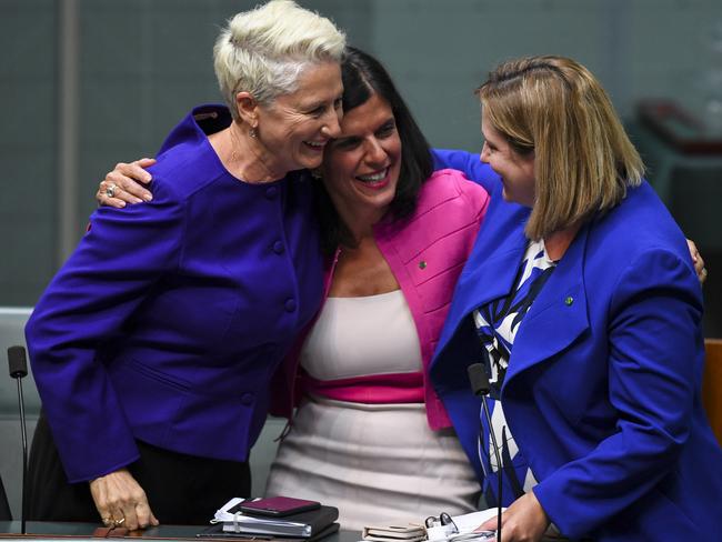 Crossbench MPs Kerryn Phelps, Julia Banks and Rebekha Sharkie react after the passing of the Medivac Bill in the House of Representatives on Tuesday. Picture: AAP