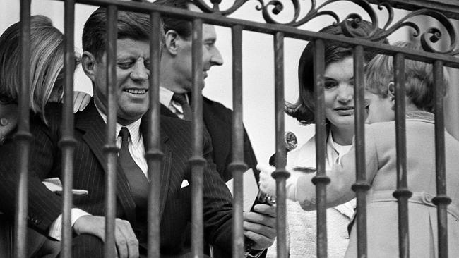 President John F. Kennedy and First Lady Jacqueline Kennedy with their children, John Jr. and Caroline, on a portico overlooking the White House south lawn in Washington on November 13, 1963, just weeks before his death. Picture: AP Photo