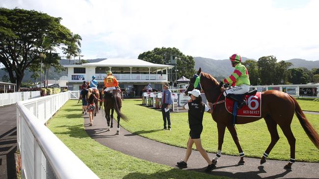 Jockeys mount their rides at an empty Cannon Park, Woree. The general public are not permitted to attend horse racing due to the government restrictions in place to reduce the spread of coronavirus. PICTURE: BRENDAN RADKE