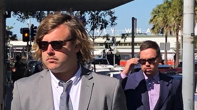 Jack Maartensz (left) arrives at Manly Court House in September with his friend Brad Riddington. Picture: Jim O'Rourke