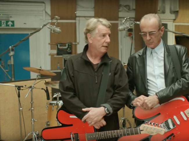 Rick Parfitt and Francis Rossi from Status Quo perform <i>Down Down </i>for Coles in a 2012 advertising campaign.