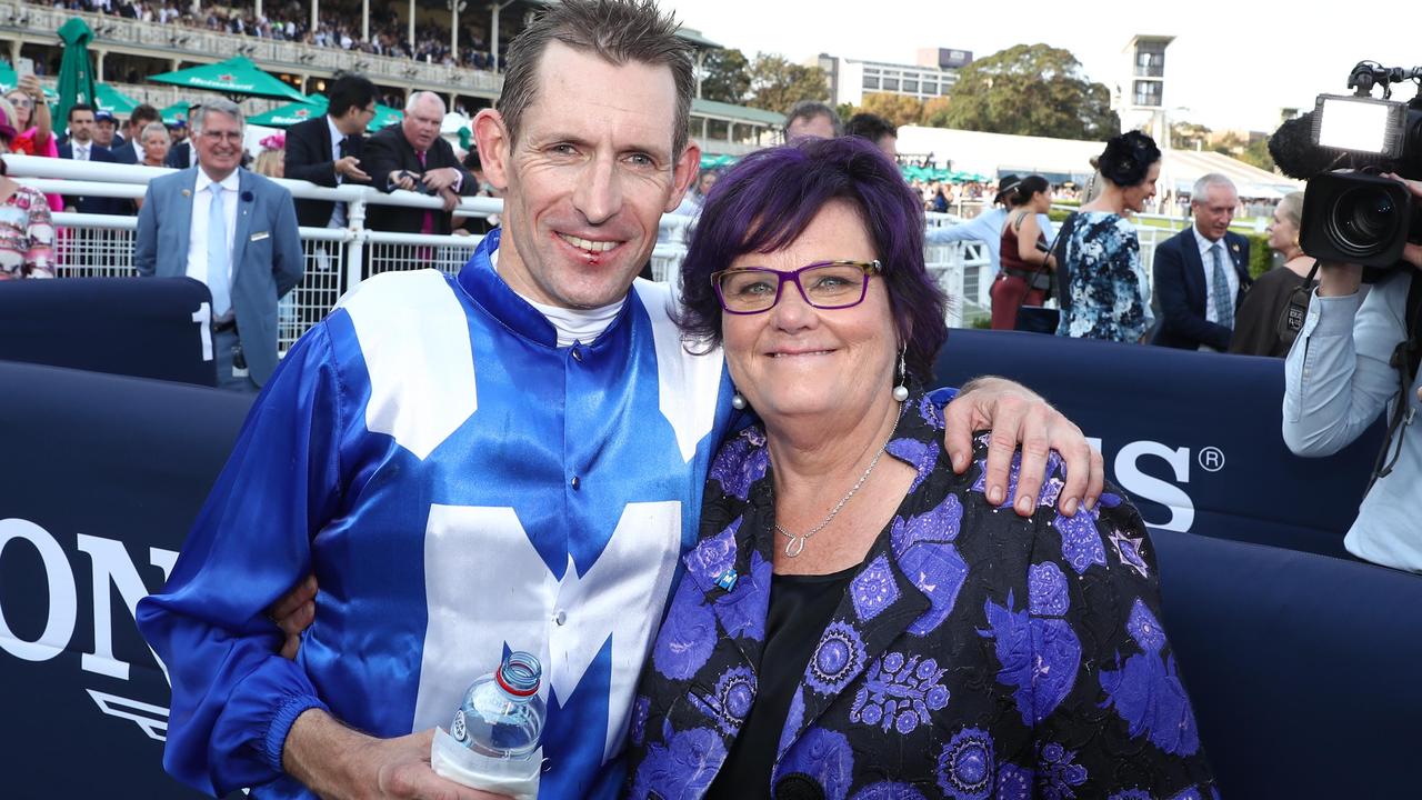 Debbie Kepitis, wearing ‘that dress’, with Winx’s jockey Hugh Bowman. Picture: Mark Metcalfe / Getty Images