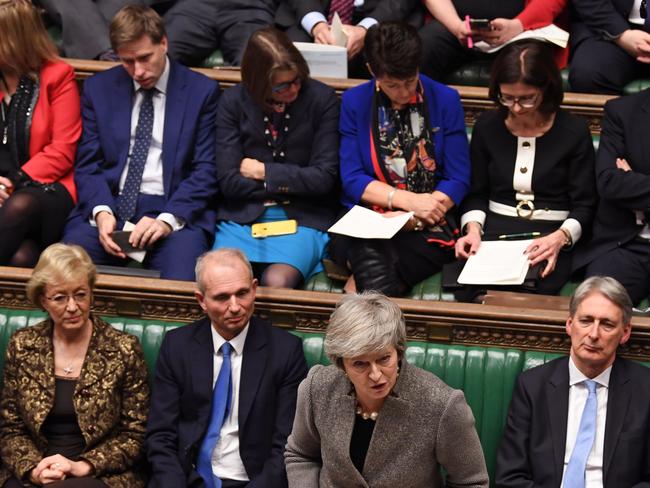 A handout photograph released by the UK Parliament shows Britain's Prime Minister Theresa May (C) making a statement to the House of Commons in London on December 17, 2018, following her attendance at an EU Summit last week. - Prime Minister Theresa May will on Monday warn MPs against supporting a second Brexit referendum, as calls mount for a public vote to break the political impasse over the deal she struck with the EU. "Let us not break faith with the British people by trying to stage another referendum," she will tell parliament, according to extracts from her speech released by Downing Street. (Photo by Jessica TAYLOR / UK PARLIAMENT / AFP) / RESTRICTED TO EDITORIAL USE - NO USE FOR ENTERTAINMENT, SATIRICAL, ADVERTISING PURPOSES - MANDATORY CREDIT " AFP PHOTO / Jessica Taylor /UK Parliament"