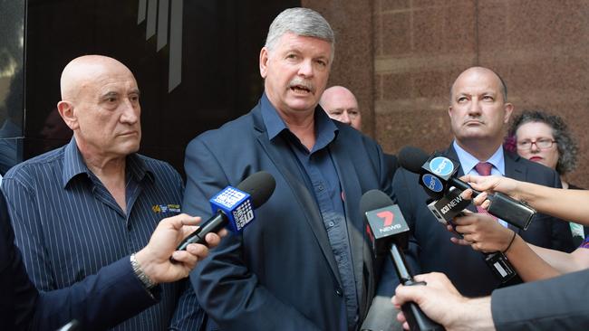 Union bosses Mark Morey and Alex Classens leave Transport Minister Andrew Constance's office.