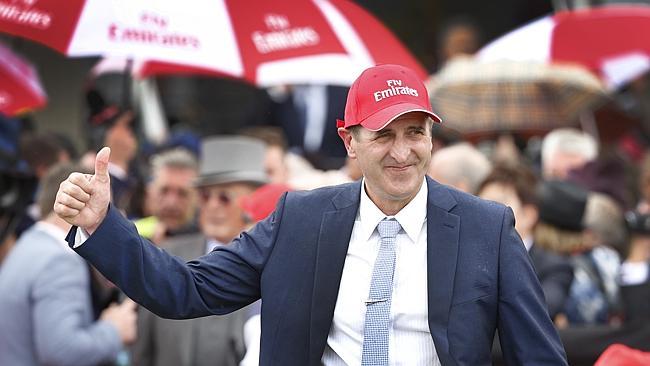 Trainer Robert Hickmott gives the thumbs up after Almandin’s Cup win. Picture: David Caird