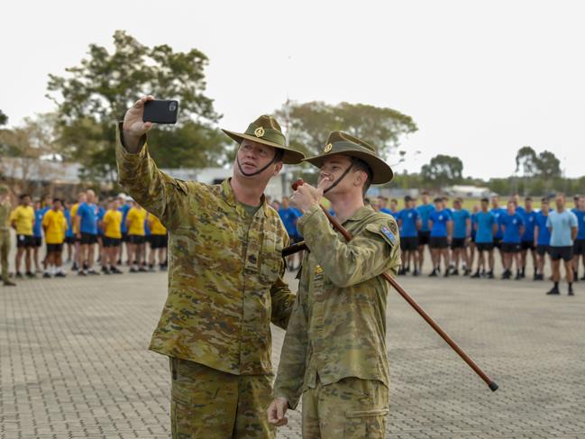 Regimental Sergeant Major of 1st Battalion Royal Australian Regiment Warrant Officer Class One Darryl Egen takes a selfie with Private Shanon Holloway during "1 RAR CO and RSM For A Day" at Lavarack Barracks Townsville, Queensland. PHOTO: PTE William McCormick