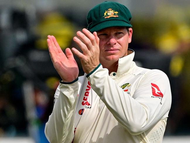 Australia's captain Steve Smith celebrates after their win at the end of the fourth day of the first Test cricket match against Sri Lanka at the Galle International Cricket Stadium in Galle on February 1, 2025. Australia won the first Test against Sri Lanka by an innings and 242 runs inside four days on February 1 to hand the hosts their worst Test cricket defeat. (Photo by Ishara S. KODIKARA / AFP)