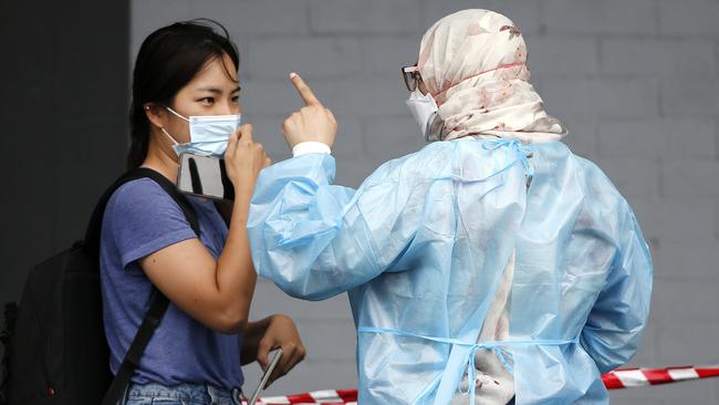 BRISBANE, AUSTRALIA - NewsWire Photos - JANUARY 6TH 2022:  Brisbane residents pictured queuing for testing at the Mater due to the recent Covid-19 Omicron strain outbreak.  Picture: NCA NewsWire / Josh Woning