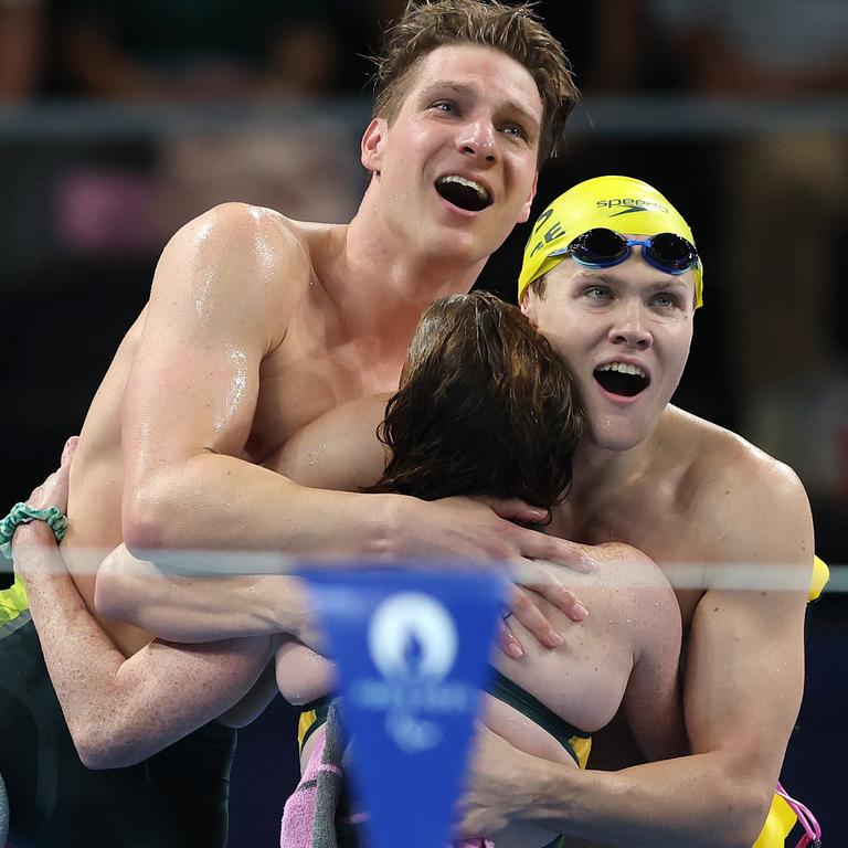 Leary’s teammates rushed to embrace her after her stunning swim. Picture: Sean M. Haffey/Getty Images