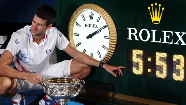 Novak Djokovic points to the time after his epic 2012 Australian Open final win over Rafael Nadal.