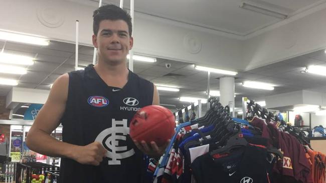 Carlton recruit Matt Kennedy models his new club jumper.