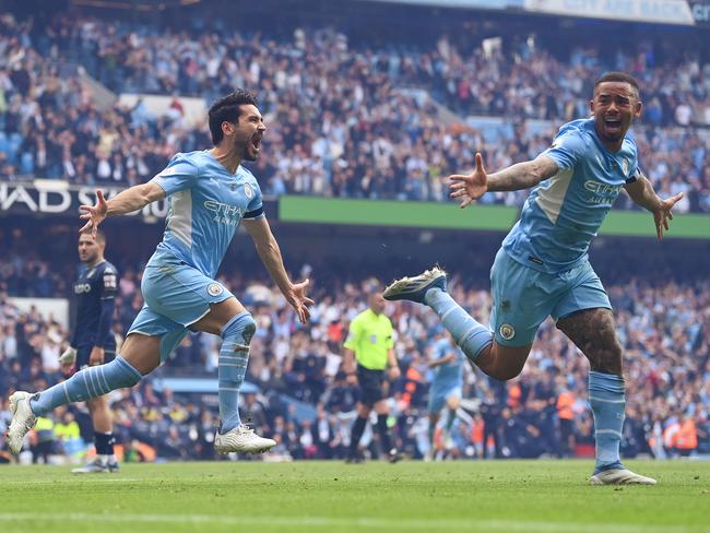 Ilkay Gundogan of Manchester City (L) celebrates after scoring their team's third goal. Picture: Michael Regan/Getty Images