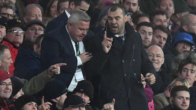 Wallabies coach Michael Cheika (right) after Australia had a try against England disallowed on Sunday.