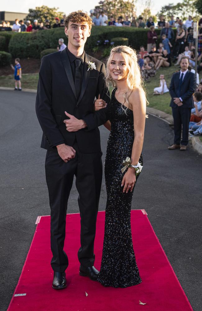 Graduates Ethan Hangan and Kaylea McConnell arrive at Mary MacKillop Catholic College formal at Highfields Cultural Centre, Thursday, November 14, 2024. Picture: Kevin Farmer