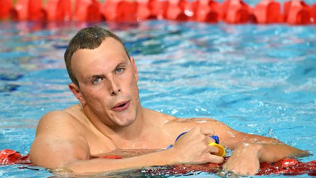 Kyle Chalmers of Australia reacts after the Men's 200m Freestyle final on day two of swimming competition at the XXI Commonwealth Games at Gold Coast Aquatic Centre on the Gold Coast, Australia, Friday, April 6, 2018. (AAP Image/Dave Hunt) NO ARCHIVING, EDITORIAL USE ONLY