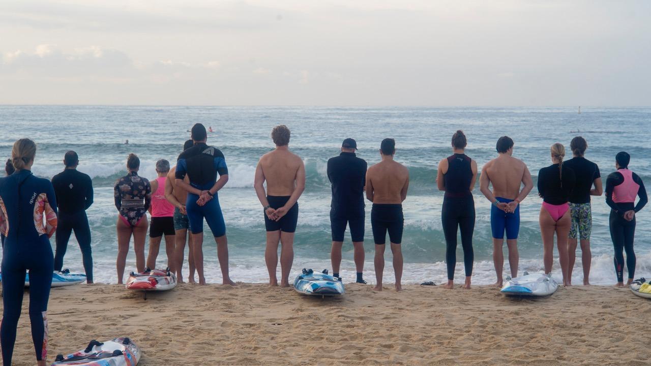 On Wednesday morning, the BSC board section honoured Louise’s passing with a minute of silence on the beach before paddling out together to catch some waves. Picture: Facebook