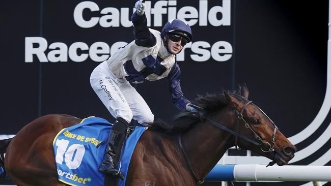 Harry Coffey celebrates after winning the Caulfield Cup aboard Duke De Sessa. Picture: Michael Klein