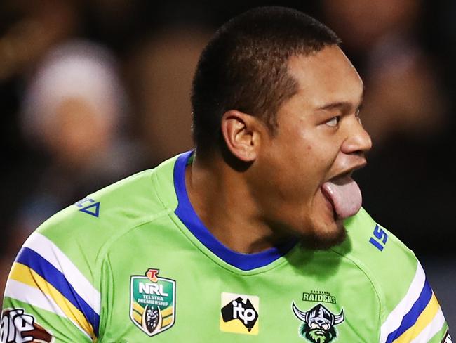 Joseph Leilua of the Raiders celebrates scoring a try during the Round 15 NRL match between the Wests Tigers and the Canberra Raiders at Campbelltown Stadium in Sydney, Sunday, June 17, 2018. (AAP Image/Brendon Thorne) NO ARCHIVING, EDITORIAL USE ONLY