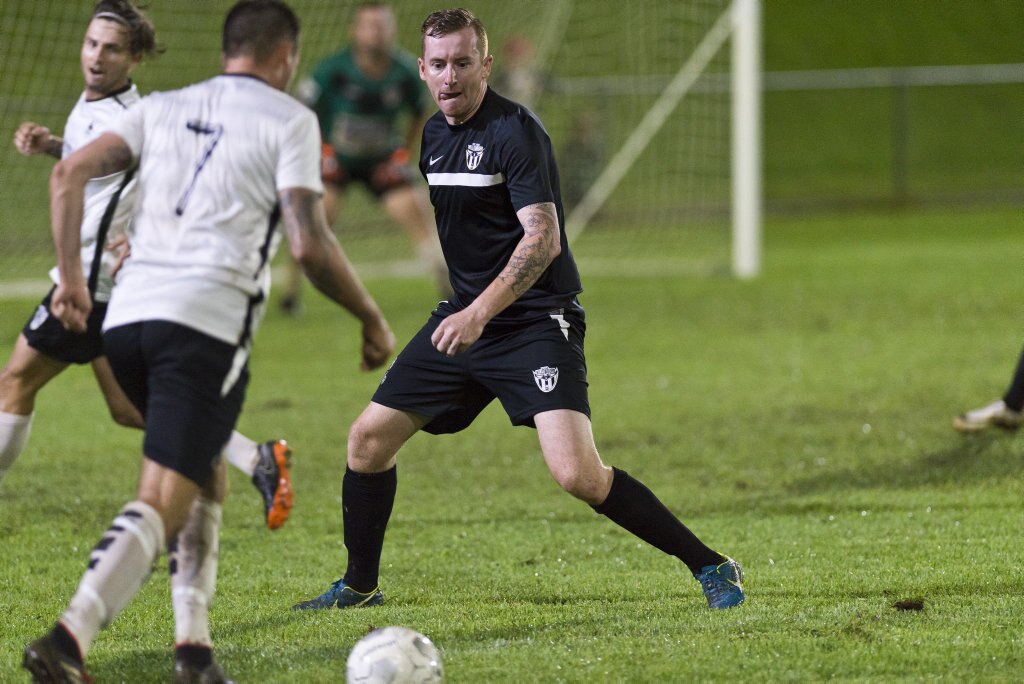 Matthew Donovan of Willowburn White defends against Willowburn in Toowoomba Football League Premier Men round five at Commonwealth Oval, Saturday, March 30, 2019. Picture: Kevin Farmer