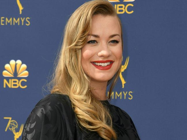 Supporting actress in a drama series nominee Yvonne Strahovski arrives for the 70th Emmy Awards at the Microsoft Theatre in Los Angeles, California on September 17, 2018. (Photo by VALERIE MACON / AFP)