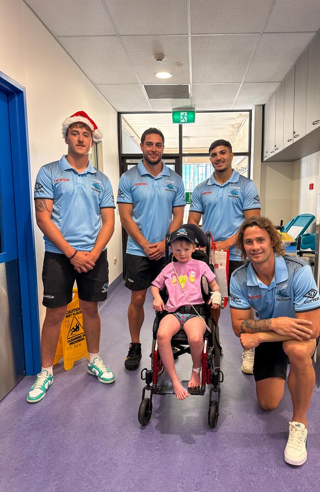 Sharks players Nikora Williams, Mawene Hiroti, Michael Gabrael and Nicho Hynes visiting sick kids at Randwick Children’s Hospital.