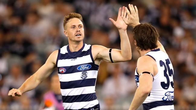 Mitch Duncan and Patrick Dangerfield celebrate a goal against Collingwood. Picture: Dylan Burns/AFL Photos