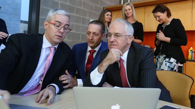 Professor Rafa Calvo talks figures with Prime Minister Malcolm Turnbull at the Brain and Mind Centre at Sydney University on Saturday. Picture: Sahlan Hayes