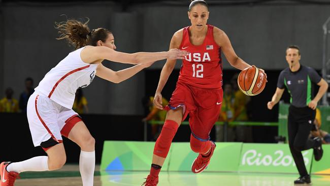 USA guard Diana Taurasi (right) works around Canada's guard Kim Gaucher during the Rio 2016 Olympic Games. Picture: AFP